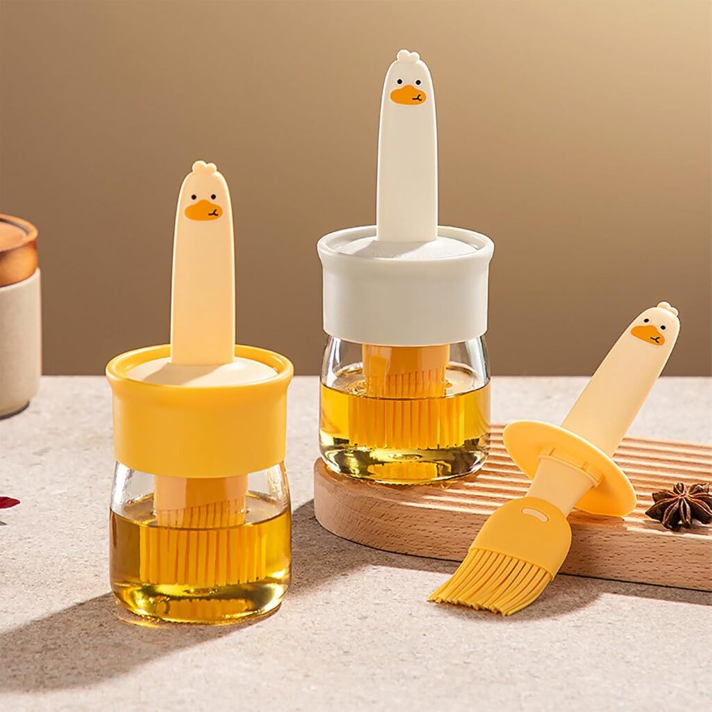 Slyford Silicone Dispenser for Cooking Oil and Vinegar crossword clue kitchen gadget